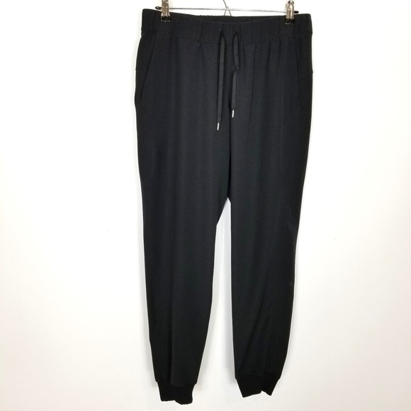 Lululemon Women On The Fly Jogger Pants Sz 8 Black Athletic Drawstring Yoga - Picture 1 of 7